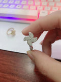Rotating copper ring with micro-inlaid windmill design in gold or silver electroplated finish