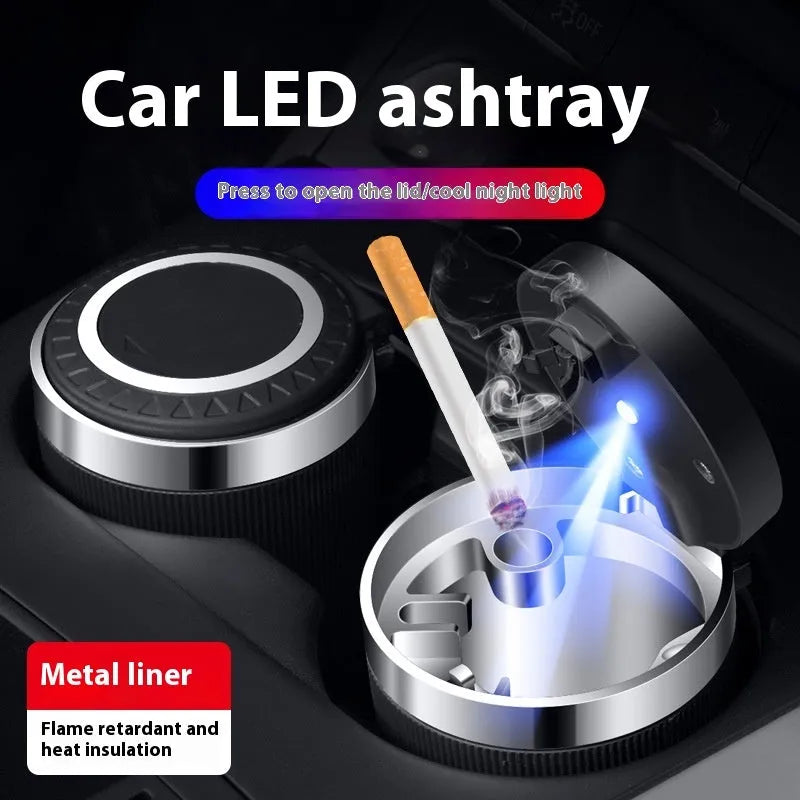 Metal ABS car ashtray with cover and blue LED light against a dark background