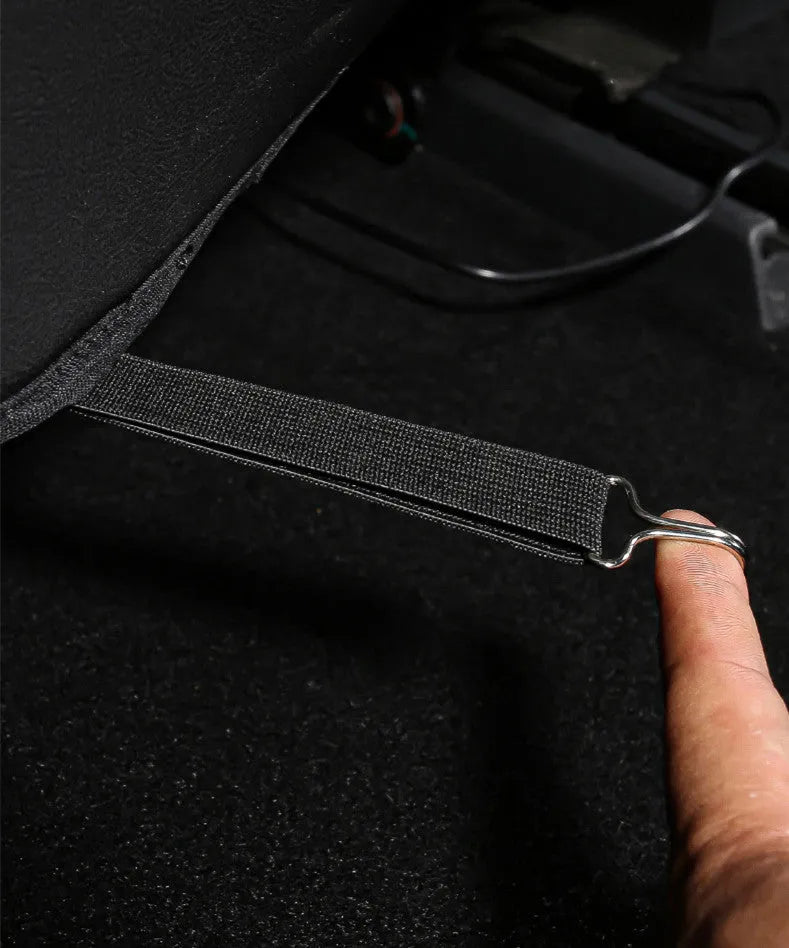 Black leather anti-kick pad for car rear seat protection with centre pocket.