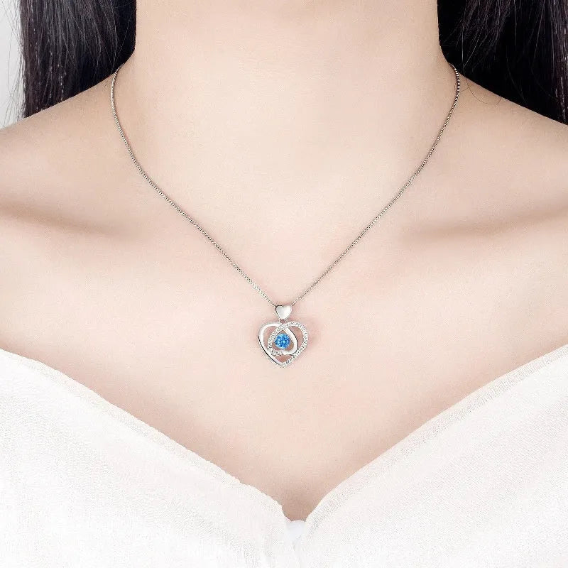 Blue heart pendant necklace and bracelet set with mixed gem inlay on geometric copper jewellery