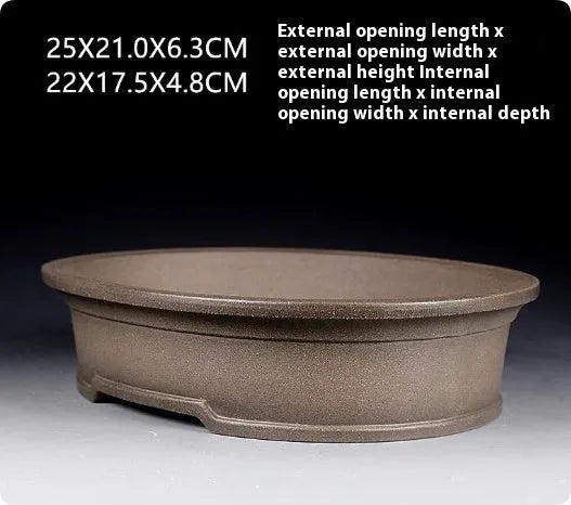 Handmade antique oval bonsai pot in purple sand pottery measuring 25x21x6.3cm