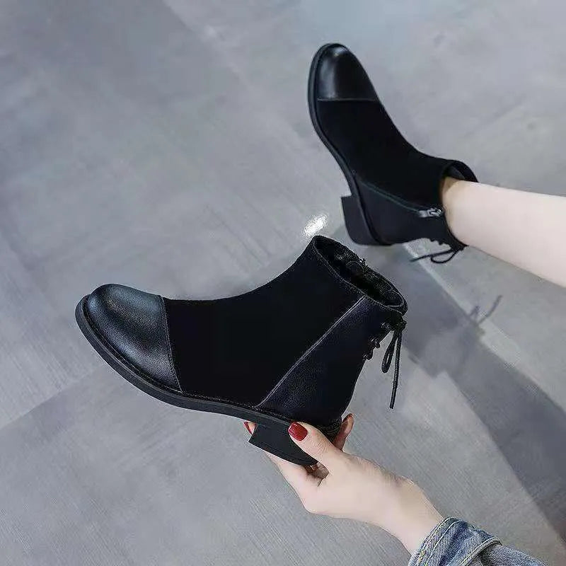 Black women's knee-high Martin boots with side zip and bow detail