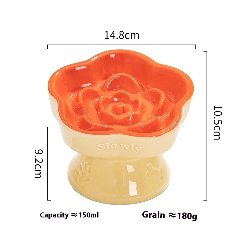 Black chin-high foot ceramic pet bowl for dogs and cats on a flat surface.