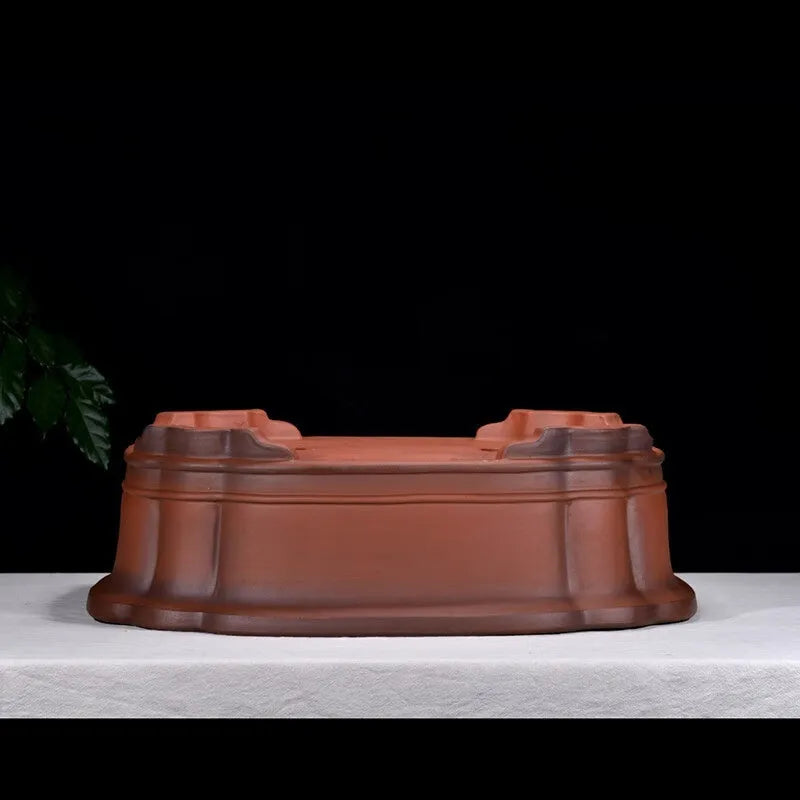 Antique finish Chinese style purple clay rectangular flowerpot measuring 71cm long, 54cm wide, and 23cm high.