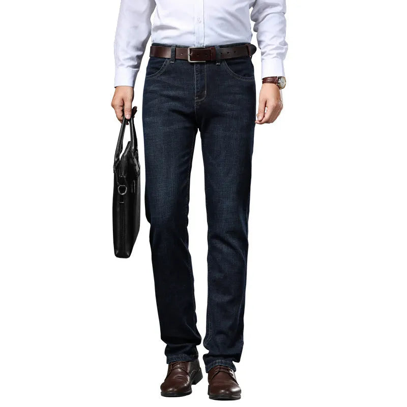 Women's loose fit, straight-leg stretch denim jeans in blue and black, showing zip fly and mid waist.