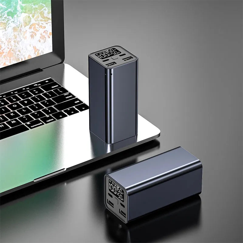 Black high power laptop charging bank with metal case showing size and USB-C port.