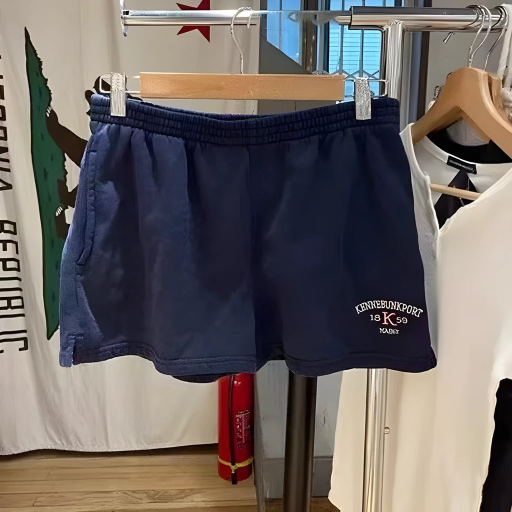 Women's dark blue cotton hot pants with white flag embroidery, shorts length athletic design