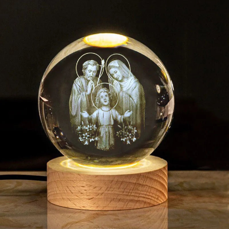 White crystal cross ornament with 6cm ball on wooden warm light base