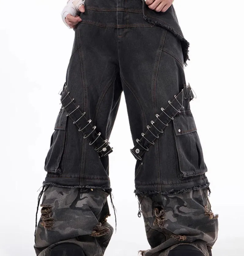 Men's grey jeans with camouflage pattern splicing and decorative pin and ribbon details on cotton denim