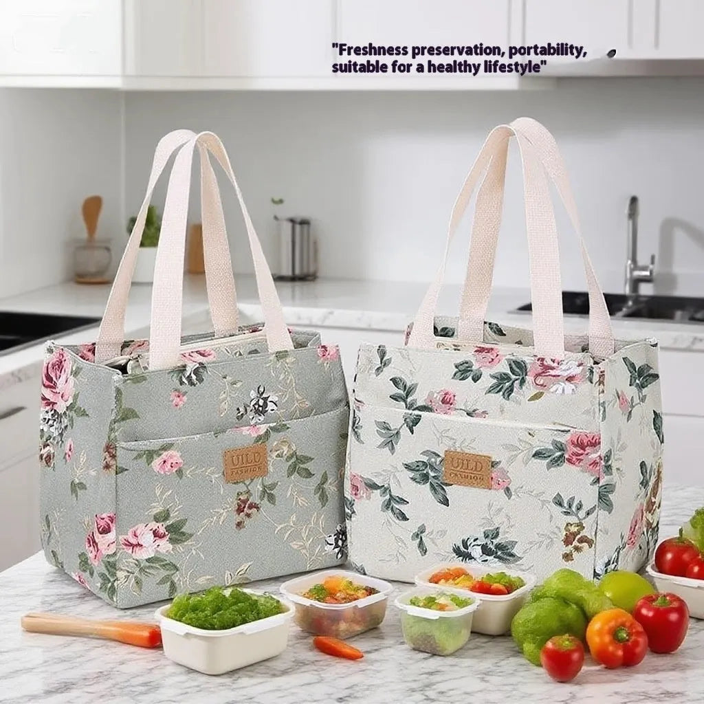 Women's printed canvas handbag with aluminium hardware showing floral design options