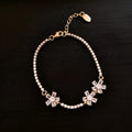 Gold geometric women's bracelet with quadrilateral design and inlaid zircon stones