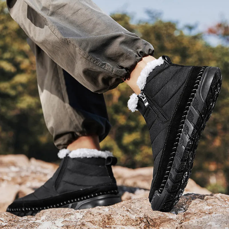 Men's plus size insulated snow boot in black with cotton upper and non-slip rubber sole.