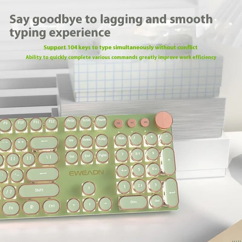 Matcha green mechanical gaming keyboard with multifunction knob on a desk