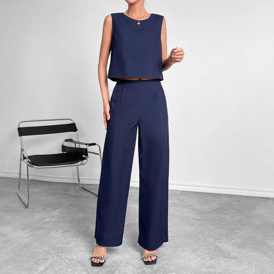 Red and navy blue women's sleeveless top and wide leg pants two-piece set on a hanger.