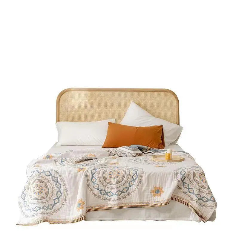 Simple cotton geometric pattern towel blanket laid flat, showing its modern design and texture.