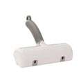 Mint green manual brush for removing cat hair from furniture and fabrics, showing its size.