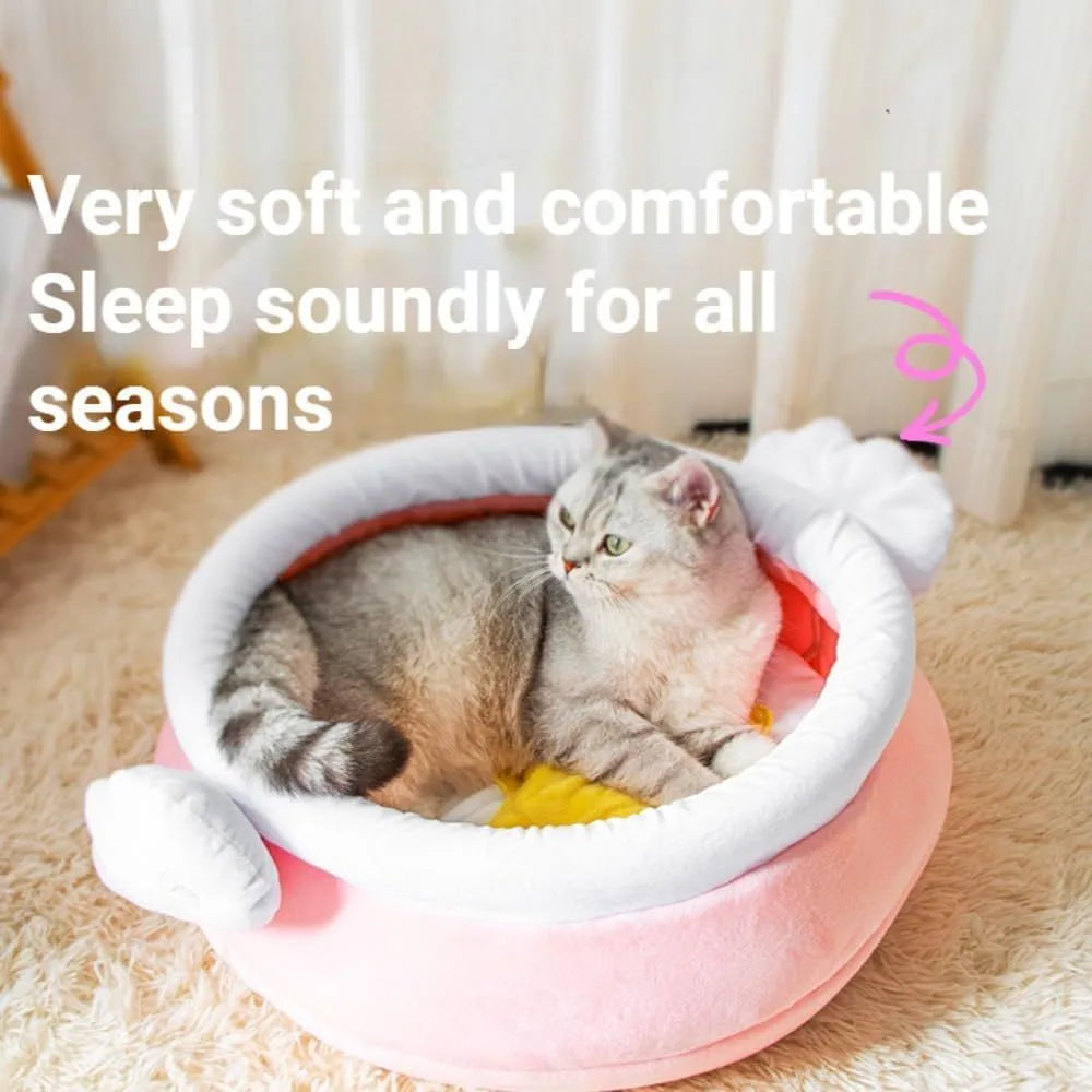 Pink honey pot-shaped cat bed with magic wand design and a soft, removable inner cushion.