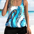 Blue tie-dyed women's floral split swimsuit with matching top and shorts in extended sizes