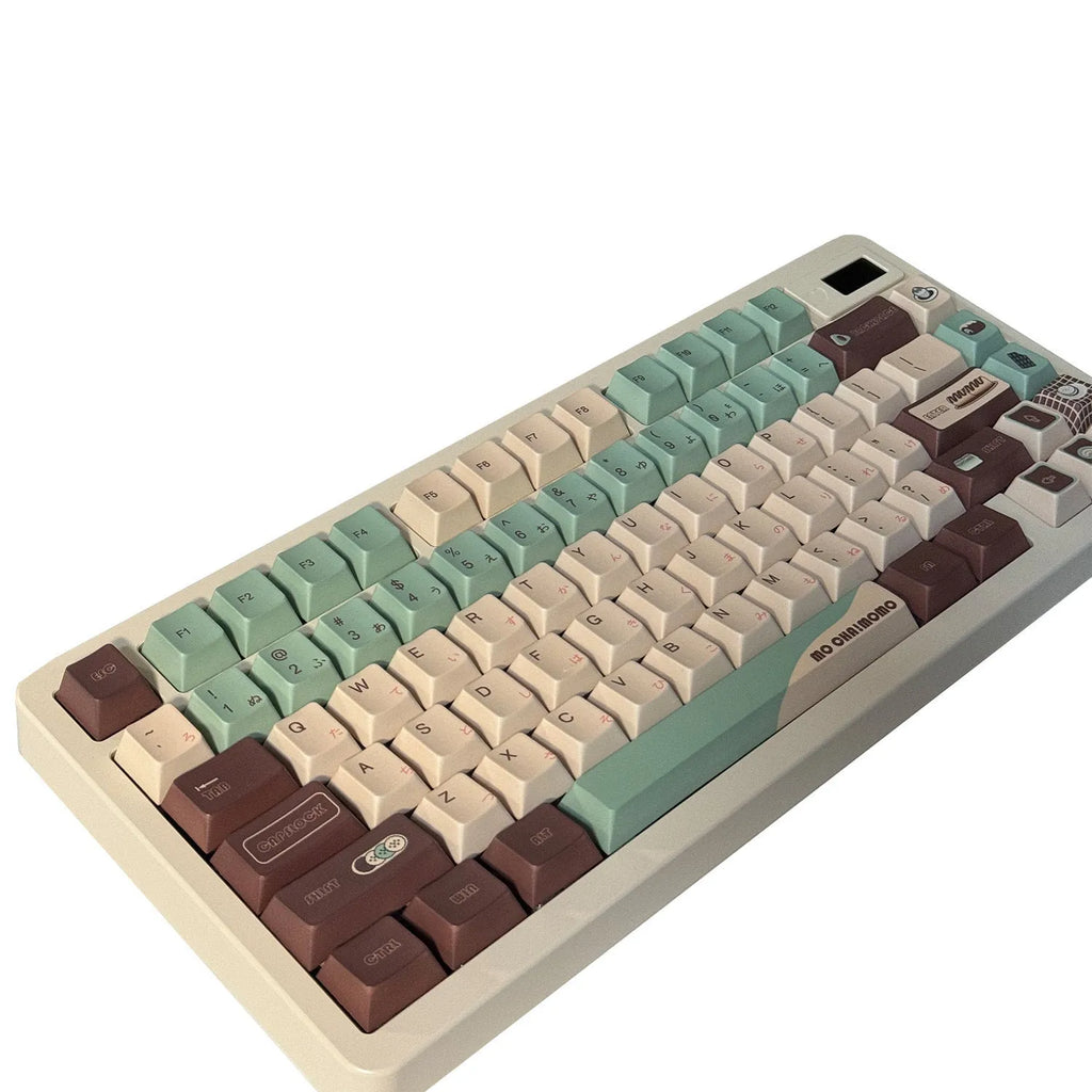 Matcha green mechanical keyboard keycap set with sublimation printing, shown with a key puller tool.