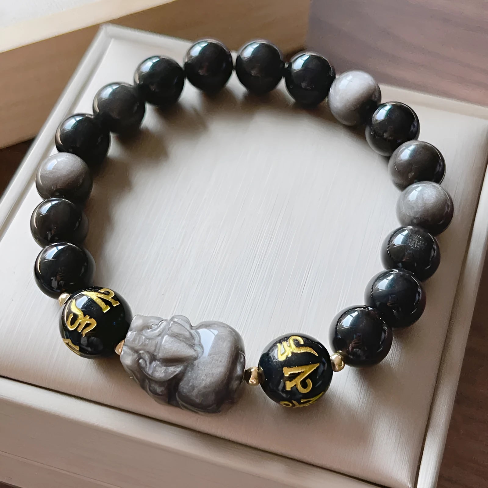 Silver stone men's bracelet with Chinese zodiac symbols and engraved proverbs on beaded design