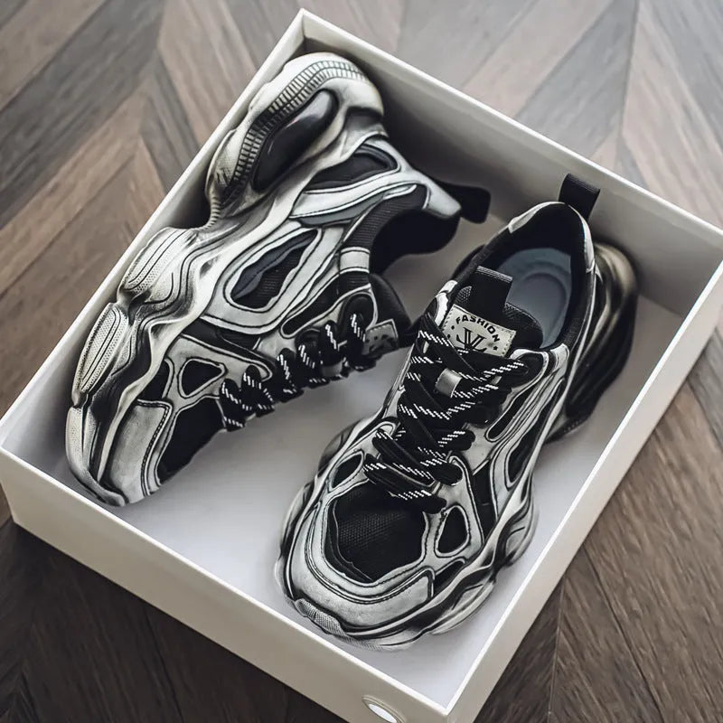 Men's black mesh sneakers with white rubber sole and platform heel on a plain background