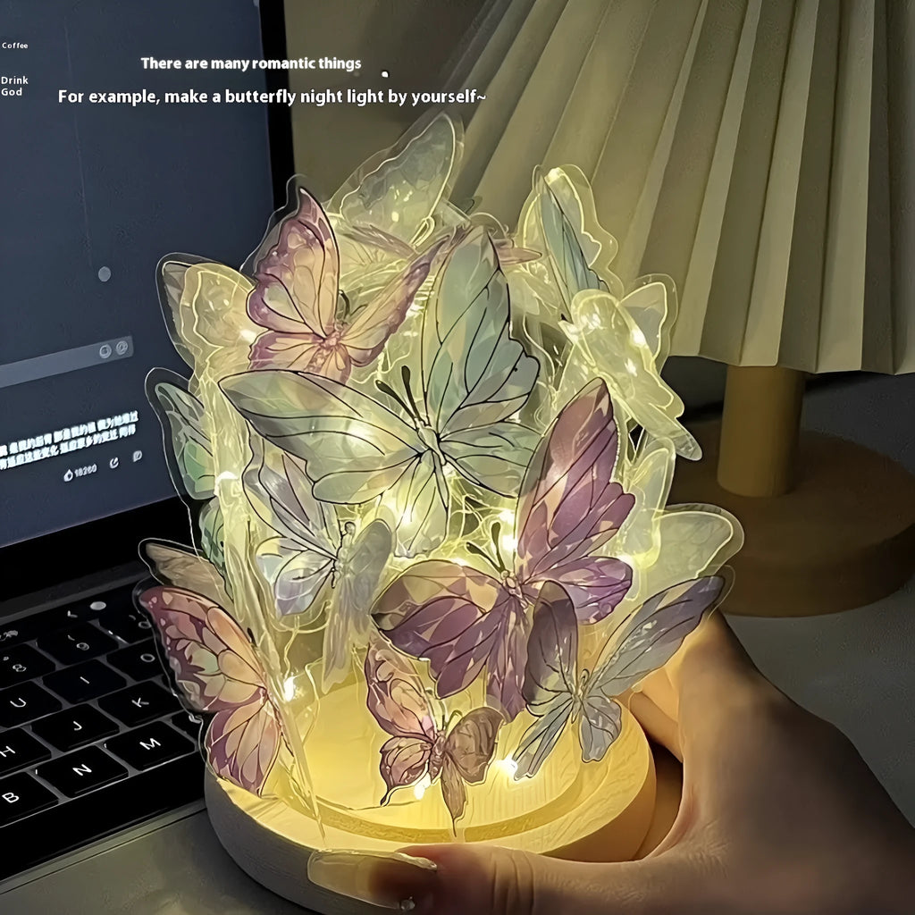 Butterfly-shaped night lamp with glass lampshade on raw wood base