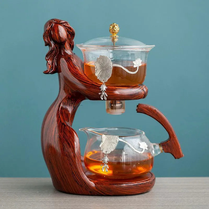 Maid semi-automatic tea set with borosilicate glass teapot, stainless steel filter, and Chinese-style woman sculpture base