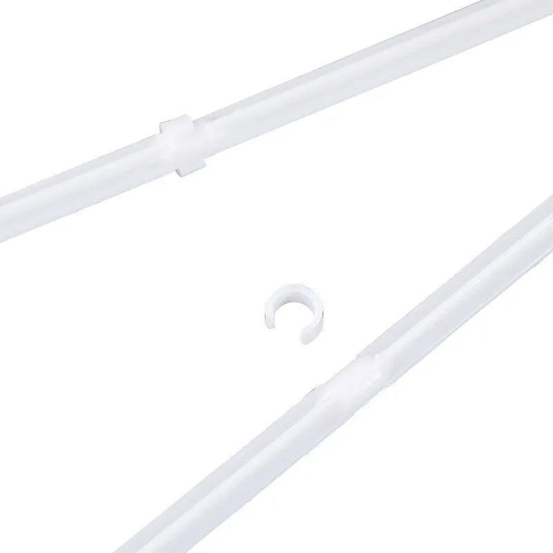 Ten white plastic car window flag pole holder clips laid out.