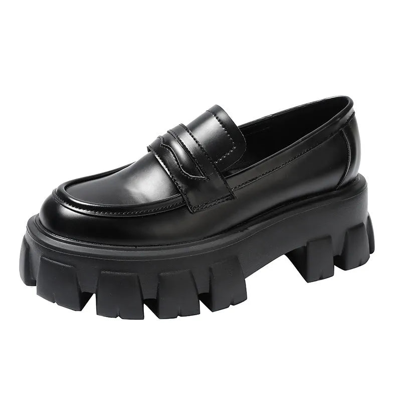 British style wide fit loafers in patent leather with a muffin base heel and rubber sole