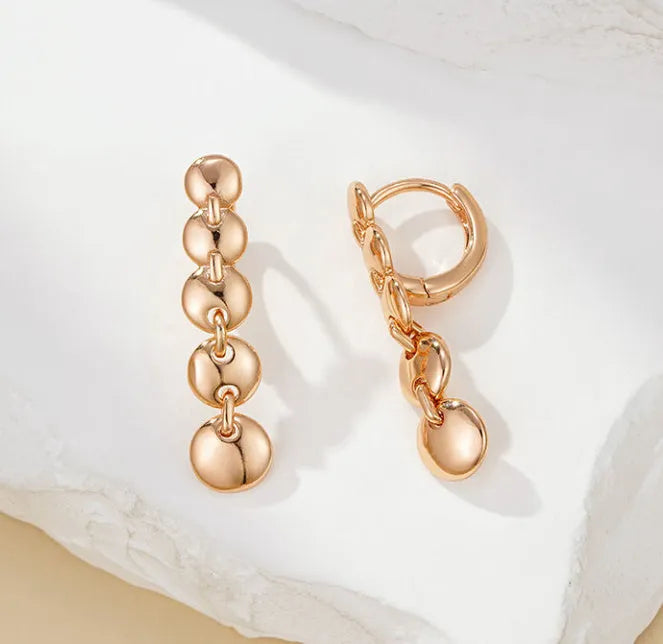 Gold-coloured copper retro earrings with woven texture in long round circle shape