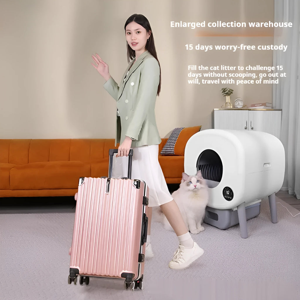 White automatic cat litter box with control panel, waste storage compartment, and cleaning mechanism