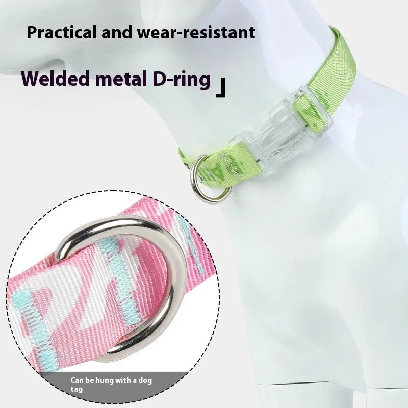 Adjustable nylon dog collar with a colourful cartoon gradient print and plastic buckle.