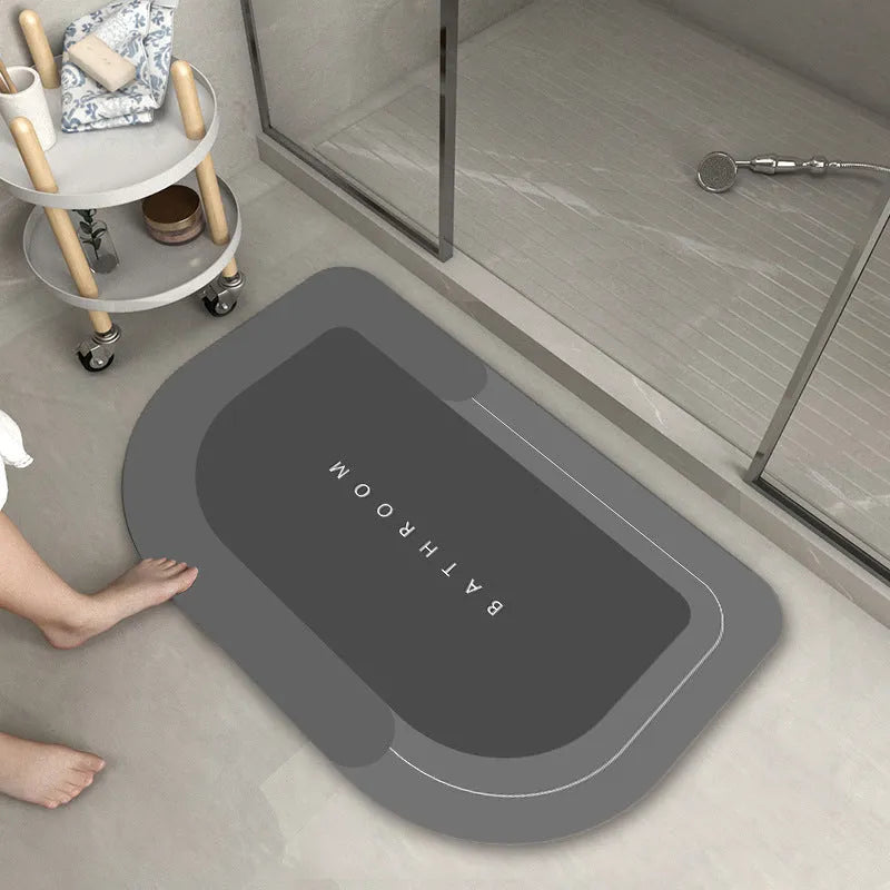Blended fabric bathroom floor mat in blue, available in oval and rectangular shapes