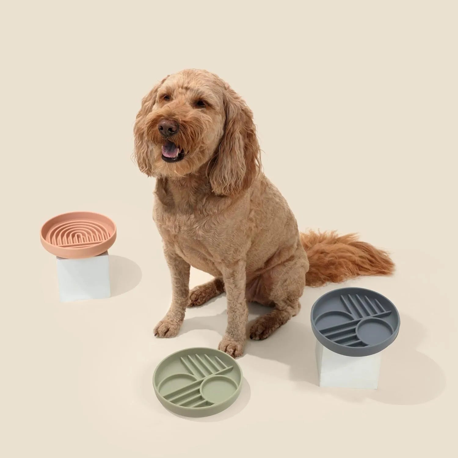 Silicone dog slow feeder bowl with ridges, shown in mustard green colour