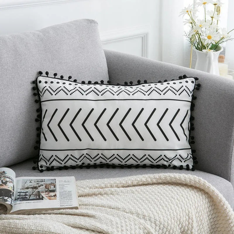 Bohemian style throw pillow on a sofa, available in light grey, black, or white, shown in 45x45cm size.