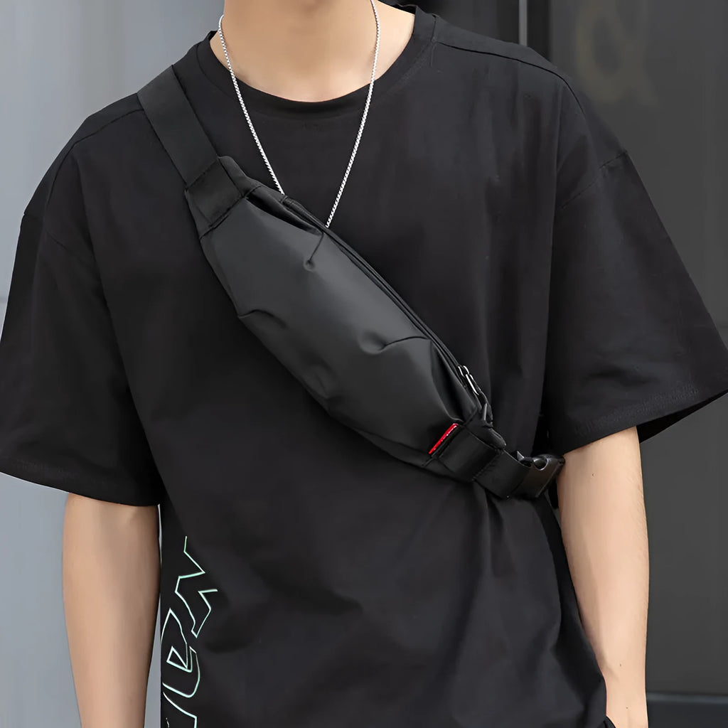 Black men's Oxford cloth crossbody waist pack showing front view and internal phone pocket.