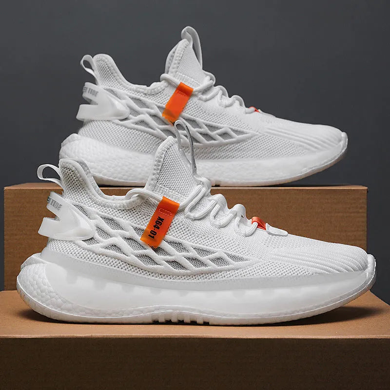 Men's white low-top platform sneakers with mesh upper and flat rubber sole on a plain background.