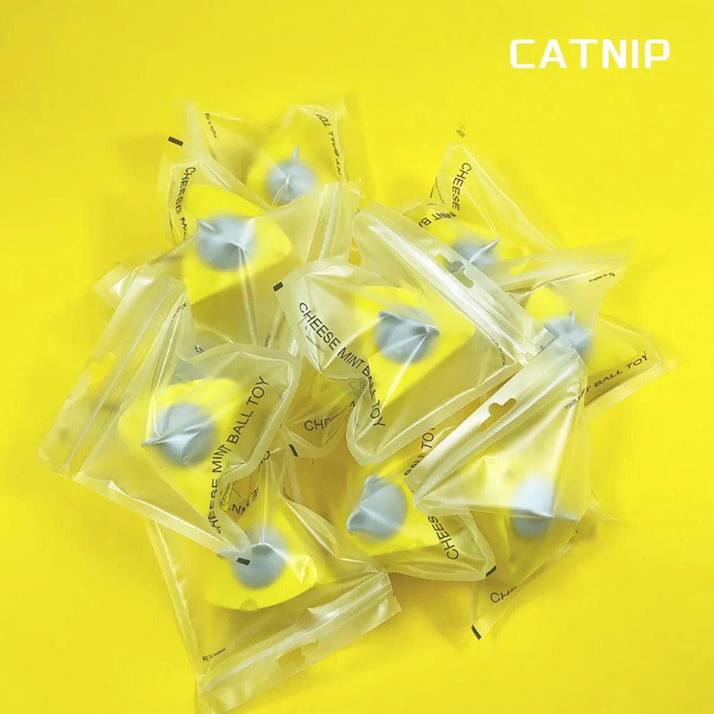 Yellow catnip and silvervine chew toy balls for cat dental care and entertainment