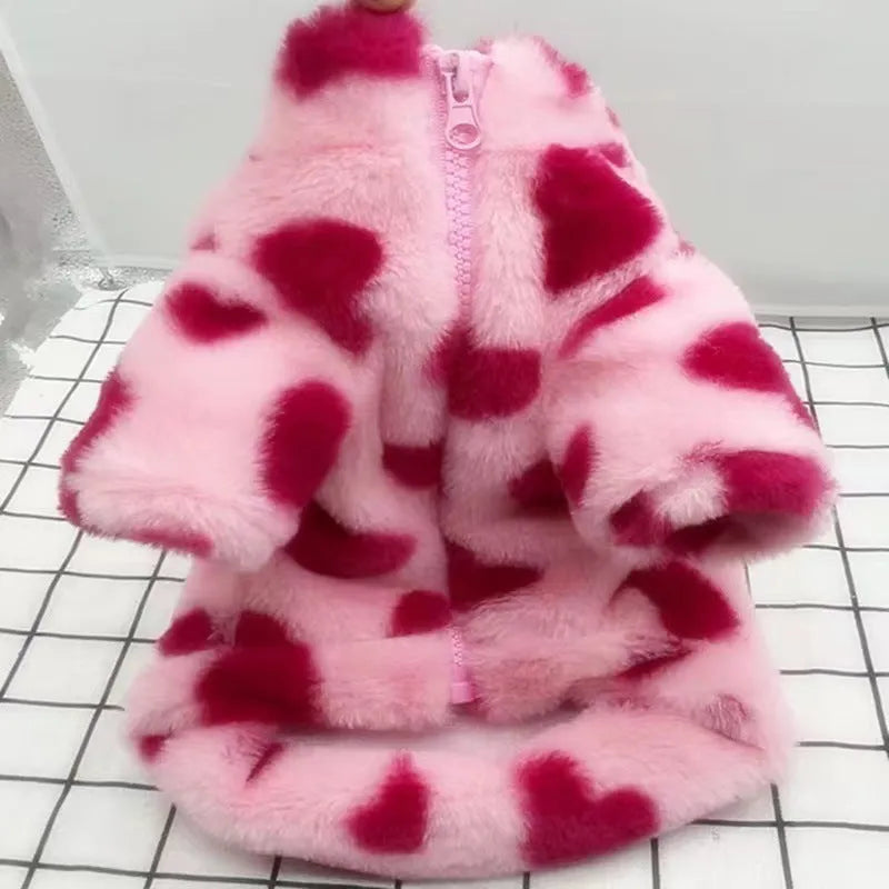 Small dog wearing pink warm plush coat with six size options from XS to 2XL