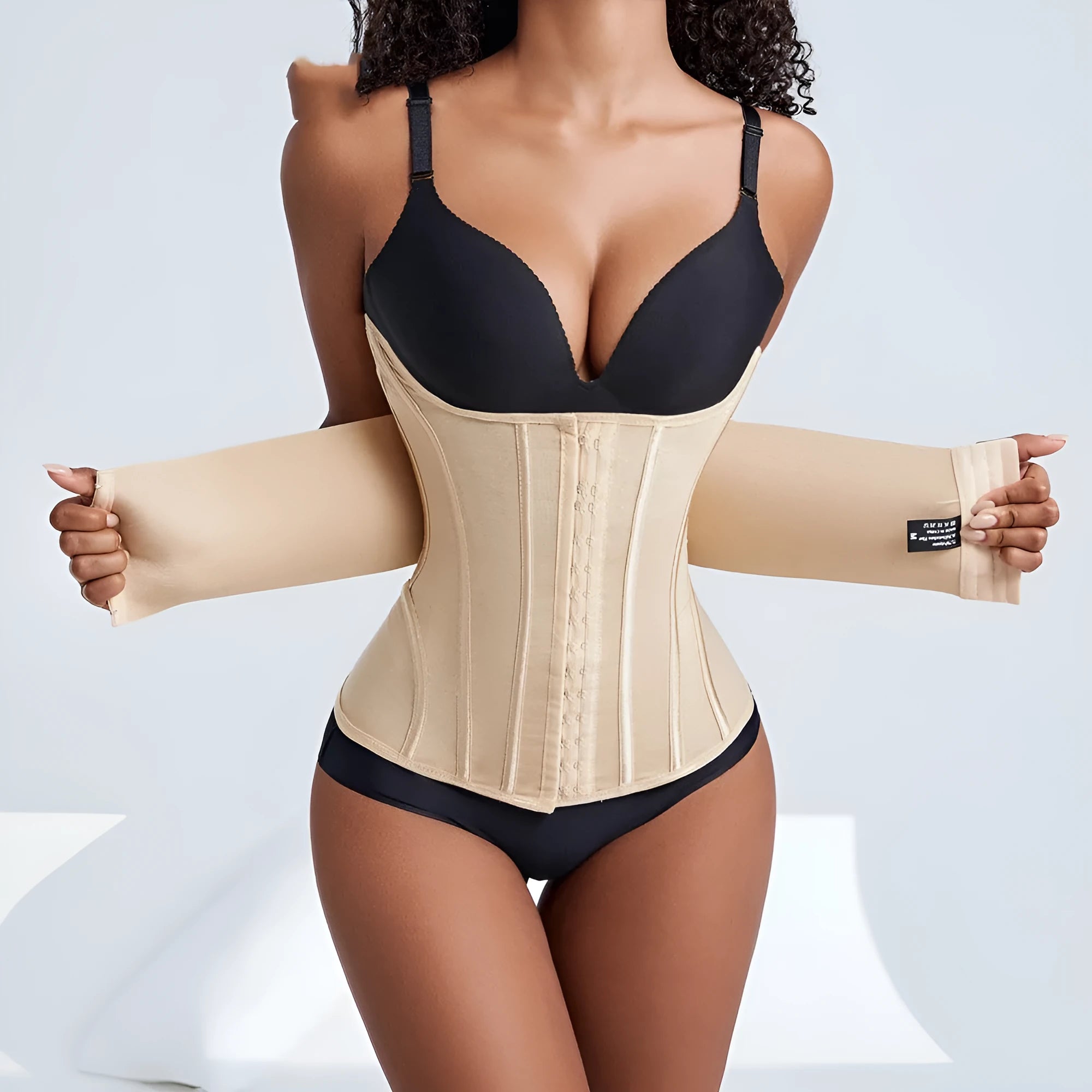Nylon waist training belly band showing adjustable belt tie in black and apricot colour options