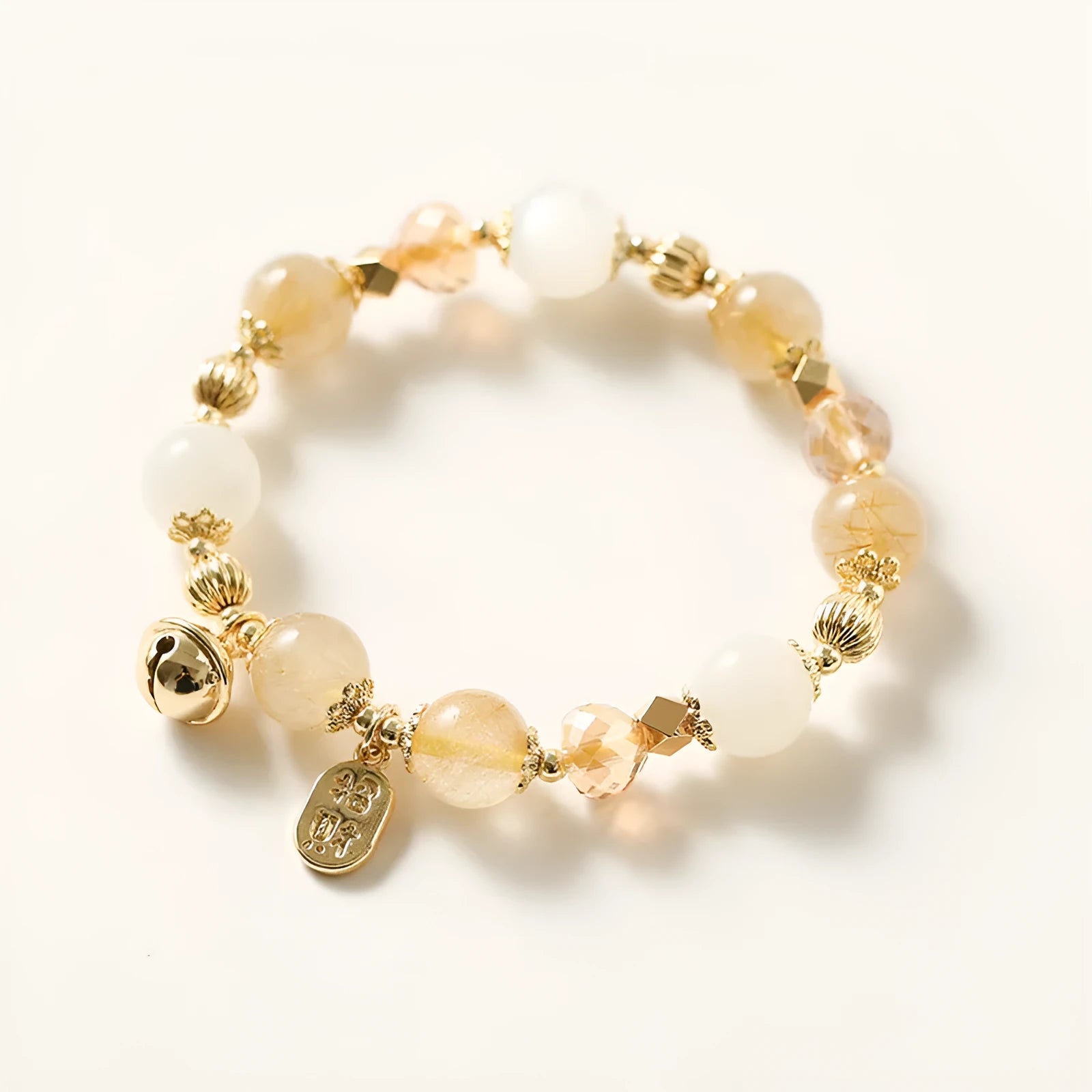 Gold electroplated rutilated quartz crystal bracelet with Korean minimalist design
