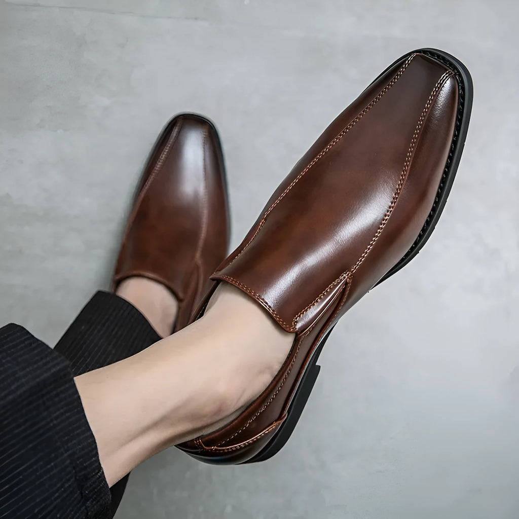 Men's black pointed toe patent leather-style shoes with totem detailing on artificial PU upper