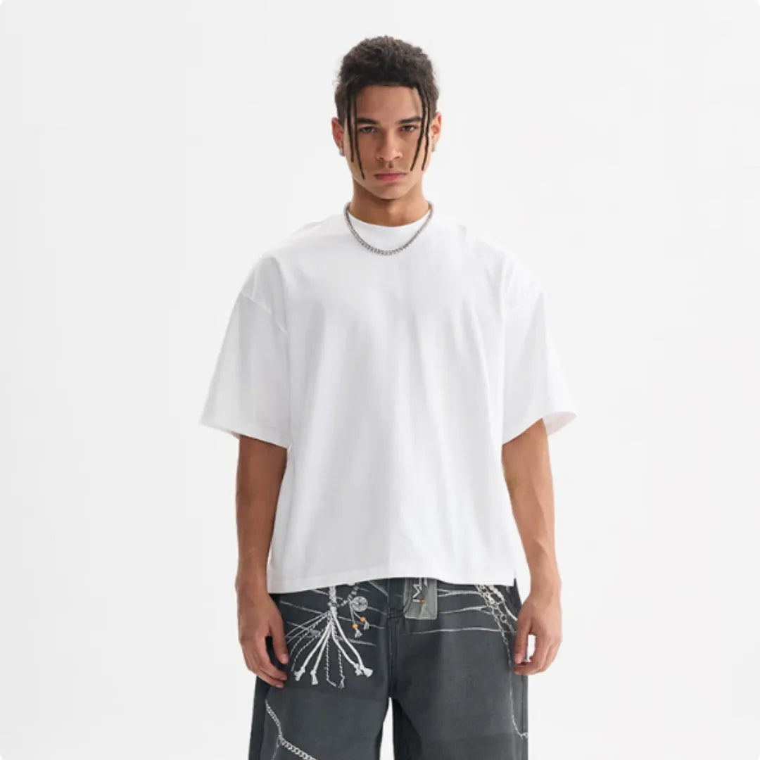 Man wearing a loose-fit apricot coloured pure cotton t-shirt, American style, short sleeves.