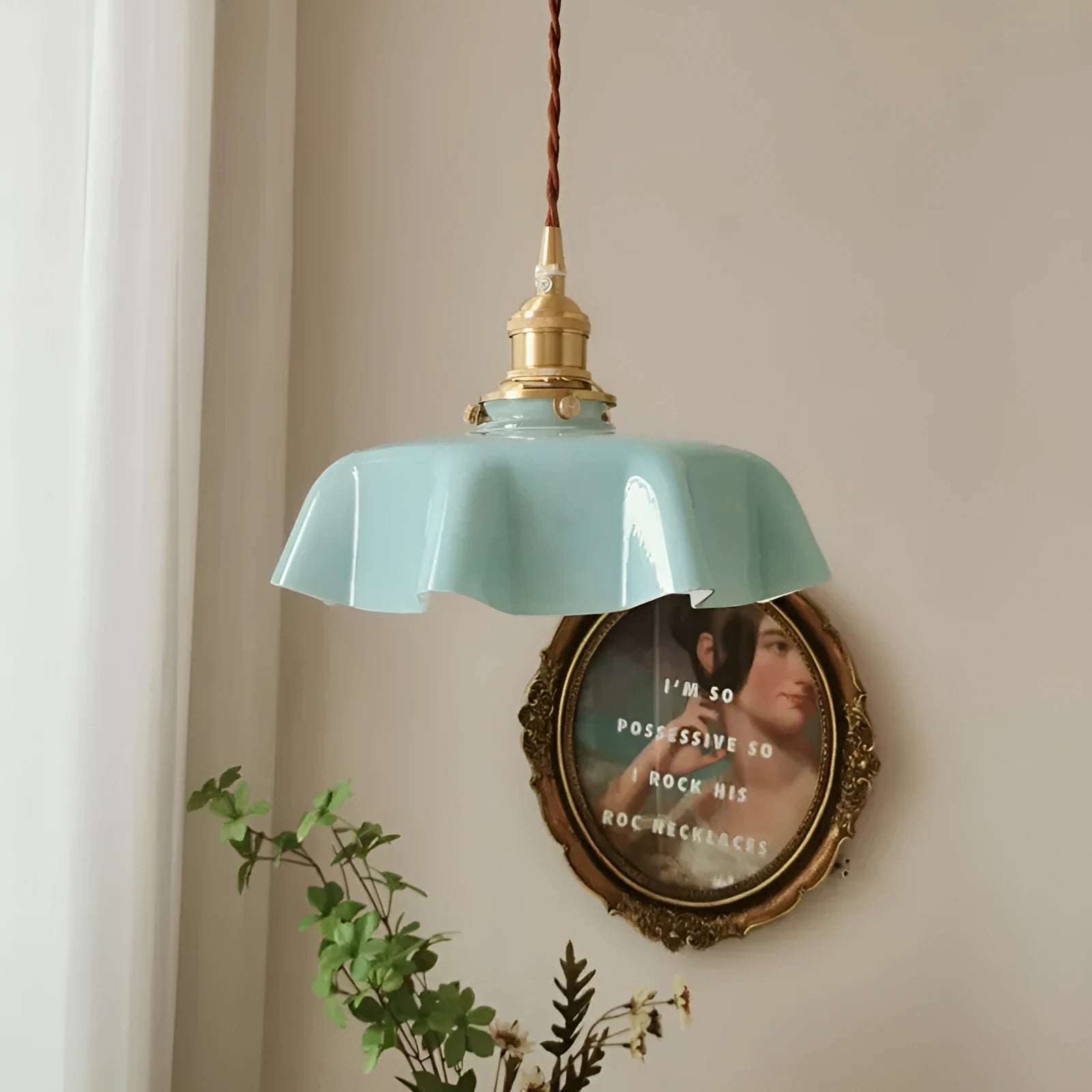 Medieval French style brass chandelier with flower bud details and glass lamp body