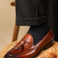 Men's polished leather tassel loafers in black and coffee colours with rubber sole