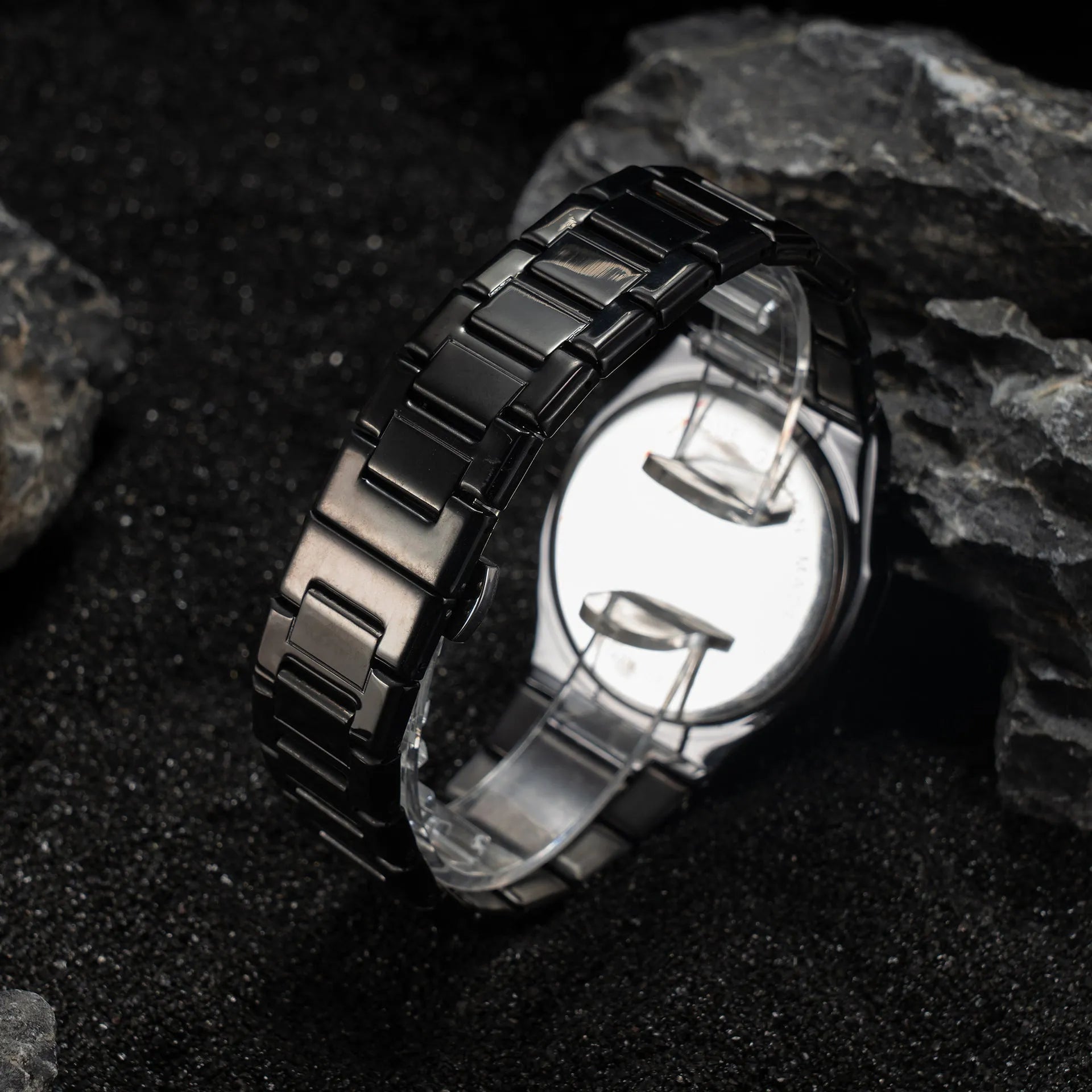Men's steel belt business watch with quartz movement and 10mm thickness on wrist.