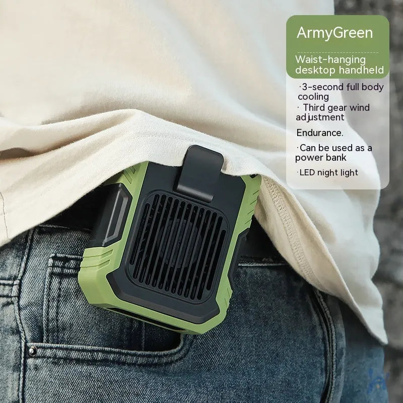 Green wrist-hanging portable fan with integrated light and USB charging port on a white background.