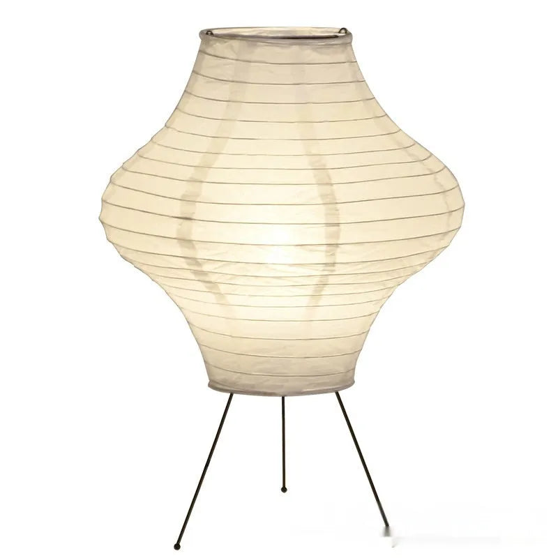 Japanese style decorative table lamp with a white Xuan paper shade on a wooden base.