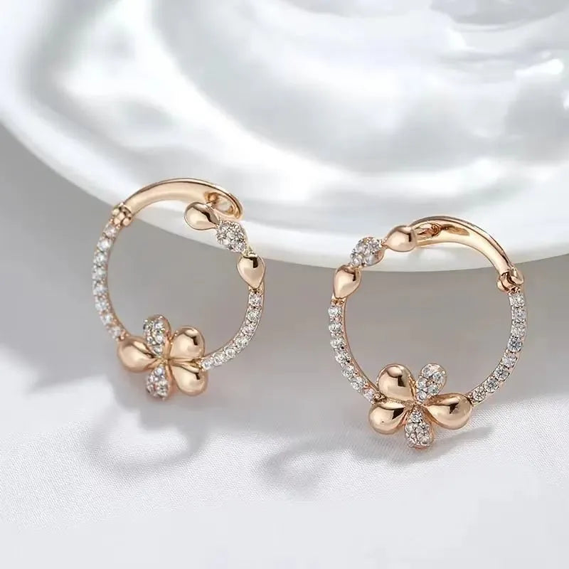 A pair of round geometric ring earrings for women with a copper base and electroplated finish.