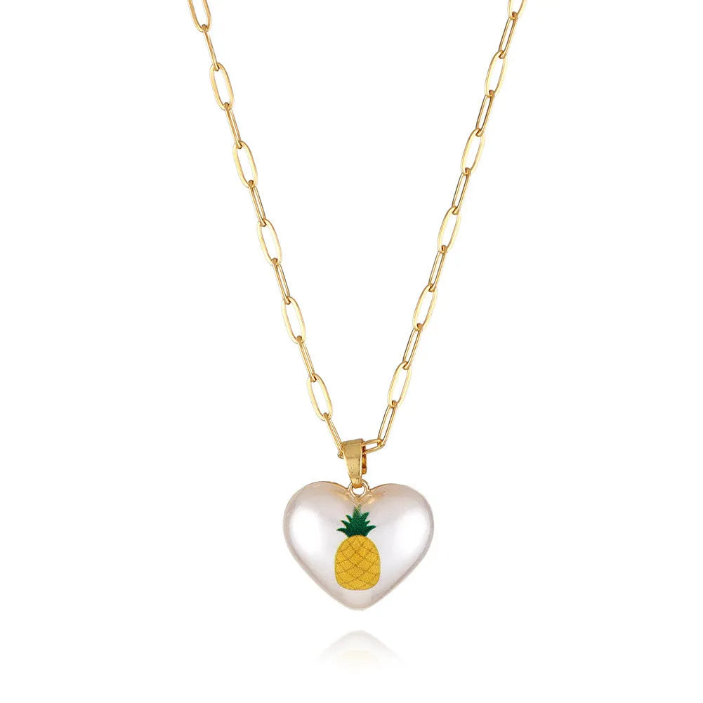Fruit charm necklace with adjustable chain showing strawberry, pineapple, apple, pear and cherry pendant options